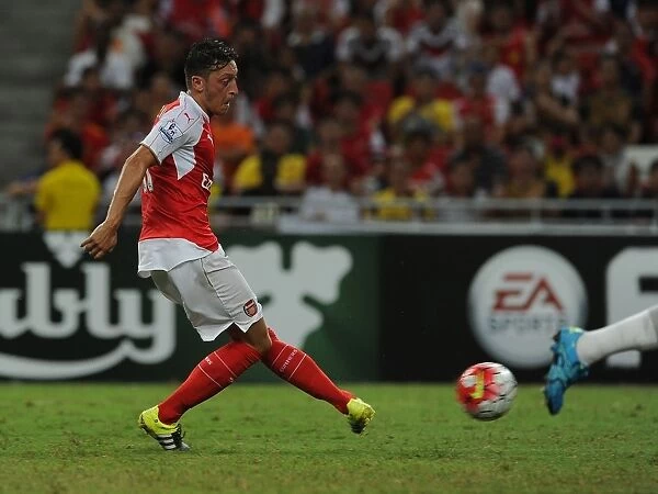 Mesut Ozil Scores His Third Goal: Arsenal Triumphs Over Everton in 2015 Asia Trophy Match