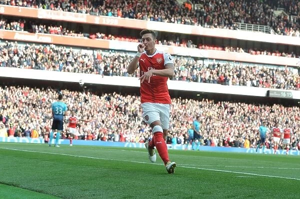Mesut Ozil Scores the Third Goal: Arsenal's Triumph over Swansea City (2016-17)