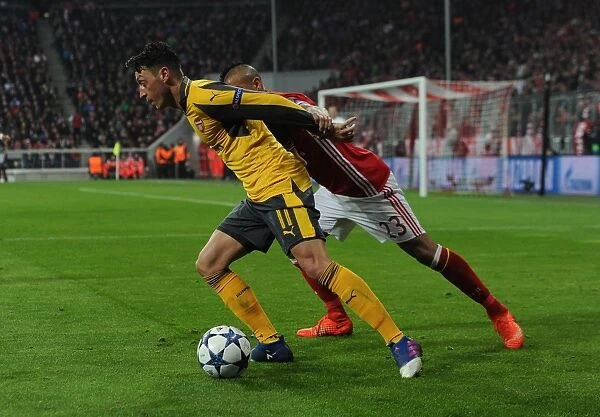 Mesut Ozil vs. Arturo Vidal: Bayern Munich Crushes Arsenal 5-1 in UEFA Champions League Round of 16 (First Leg)