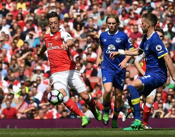 Mesut Ozil vs. Morgan Schneiderlin: A Battle in the Arsenal v Everton Premier League Clash