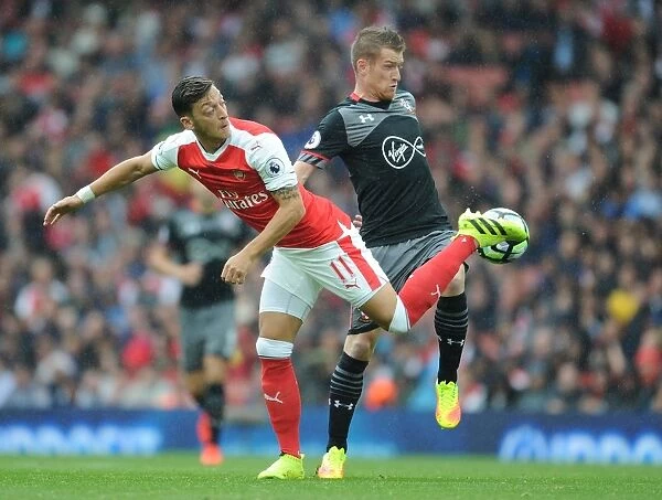 Mesut Ozil vs Steven Davis: A Battle in the Arsenal vs Southampton Rivalry