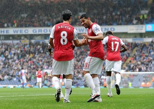 Mikel Arteta and Andre Santos Celebrate Arsenal's Goal in Exciting 4-3 Win Over Blackburn Rovers, Premier League 2011-12
