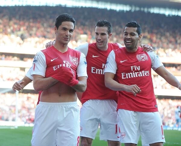 Mikel Arteta, Andre Santos, and Robin van Persie Celebrate Arsenal's Goals Against Aston Villa (2011-12)