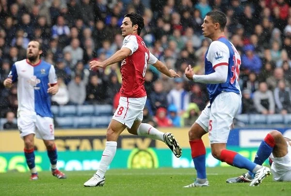 Mikel Arteta Scores Under Pressure: Arsenal's Comeback Against Blackburn Rovers in the Premier League (4-3)
