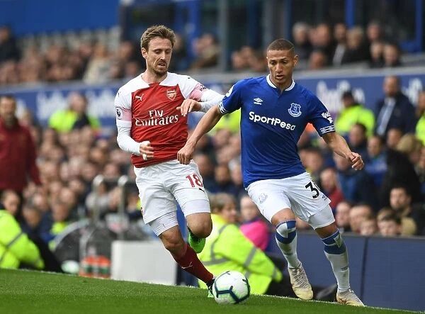 Monreal's Defensive Stand: Shutting Down Richarlison in the Premier League Clash at Goodison Park, 2018-19