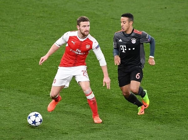 Mustafi vs. Thiago: A Champions League Showdown - Arsenal's Titans Clash in Battle with Bayern Munich