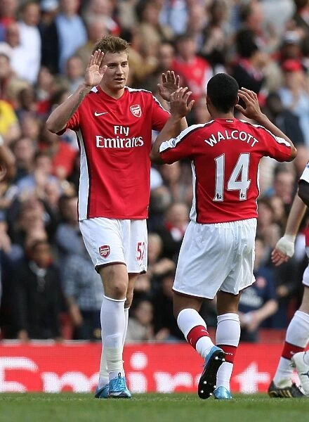 Nicklas Bendtner celebrates scoring the 6th Arsenal