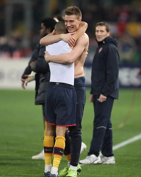 Nicklas Bendtner & Gael Clichy (Arsenal) celebrate after the match
