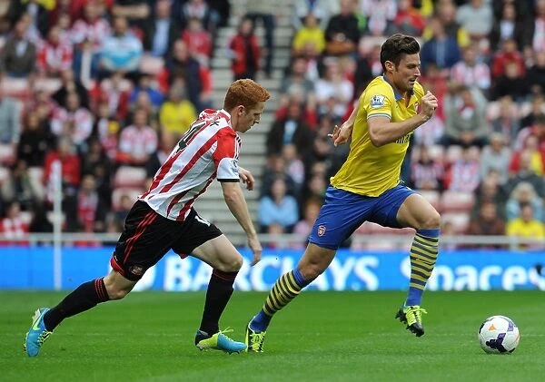 Olivier Giroud (Arsenal) Jack Colback (Sunderland). Sunderland 1: 3 Arsenal. Barclays Premier League