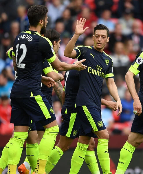 Olivier Giroud and Mesut Ozil Celebrate Arsenal's Goal Against Stoke City, 2016-17 Season