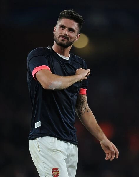 Olivier Giroud's Euphoric Moment: Arsenal's Stunner Against Bayern Munich in the Champions League