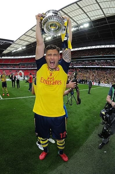 Olivier Giroud's FA Cup Victory Celebration: Arsenal's Triumph over Aston Villa