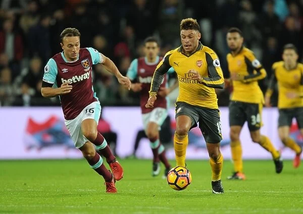Oxlade-Chamberlain Outwits Noble: Arsenal's Midfield Genius Shines in Premier League Clash