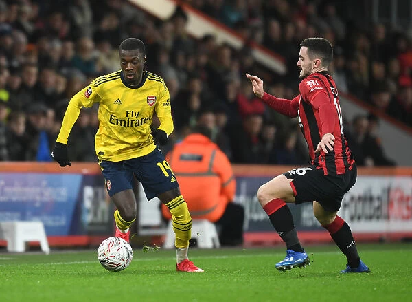 Pepe vs Cook: FA Cup Battle - Arsenal's Nicolas Pepe Clashes with AFC Bournemouth's Lewis Cook