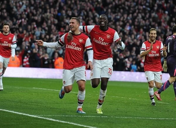 Podolski and Sanogo's Unforgettable Goal Celebration: Arsenal's FA Cup Victory Over Liverpool