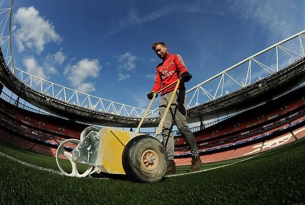 Preparing the Emirates Turf: Arsenal Groundsman's Mission before Arsenal FC vs. FC Bayern Munich - UEFA Champions League Showdown