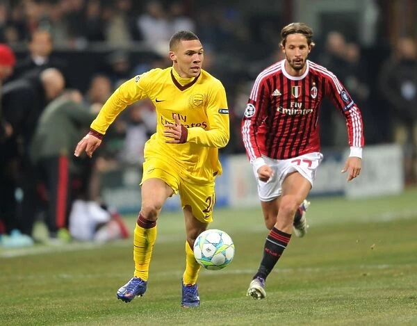 Race to Victory: Kieran Gibbs Outpaces Luca Antonini in AC Milan vs. Arsenal UEFA Champions League Clash