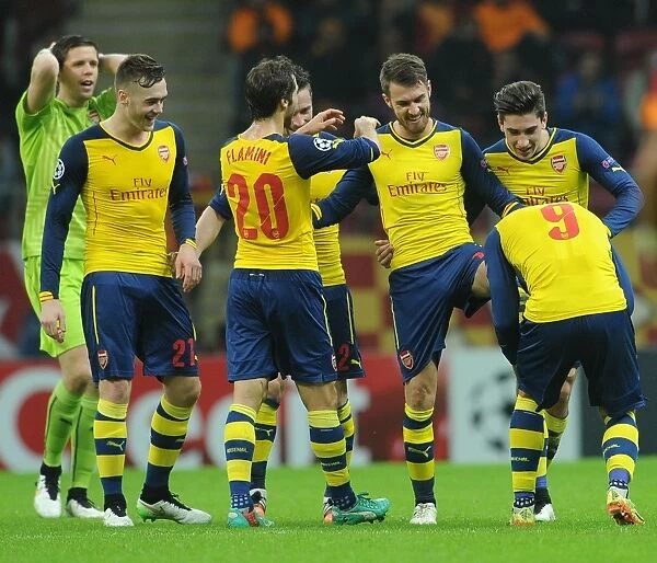 Ramsey and Podolski Celebrate Arsenal's Champions League Goals Against Galatasaray