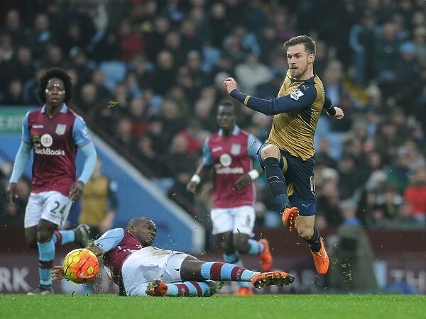 Ramsey vs. Okore: A Football Battle at its Intense Best - Aston Villa vs. Arsenal (December 2015)