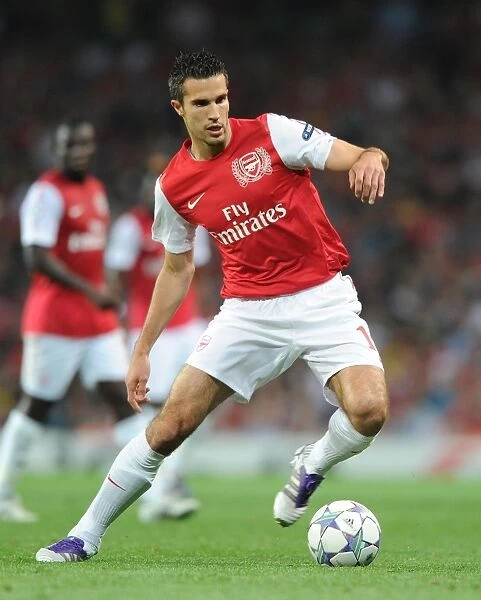 Robin van Persie in Action for Arsenal against Olympiacos, UEFA Champions League 2011-12