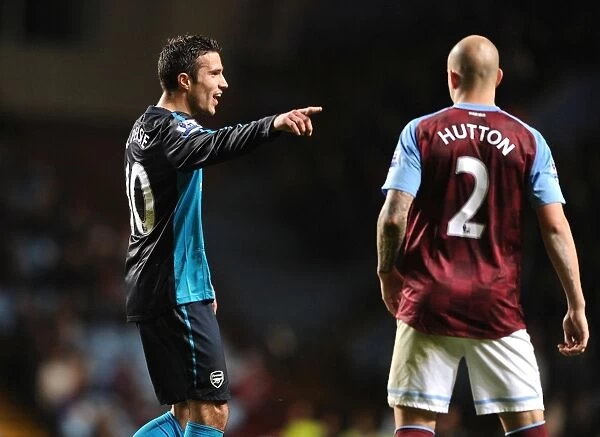 Robin van Persie and Alan Hutton: A Moment of Respite Amidst the Aston Villa vs. Arsenal Rivalry (2011-12)