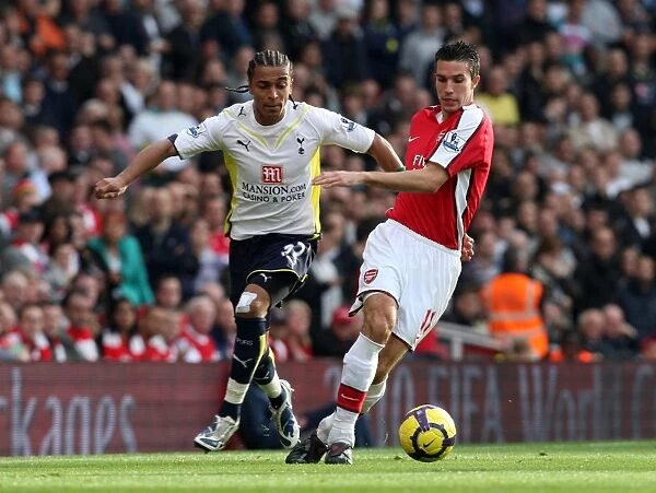 Robin van Persie (Arsenal) Benoit Assou-Ekotto (Tottenham)