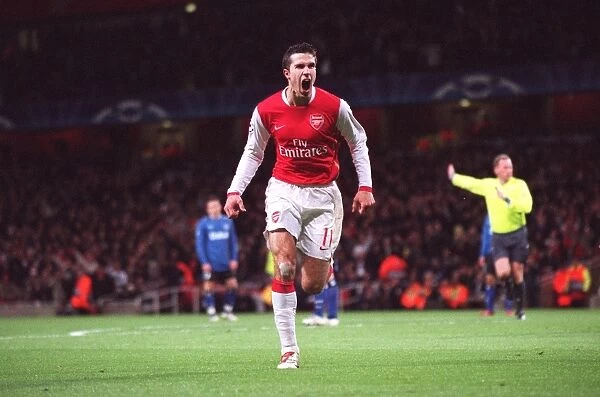 Robin van Persie celebrates Arsenals 1st goal