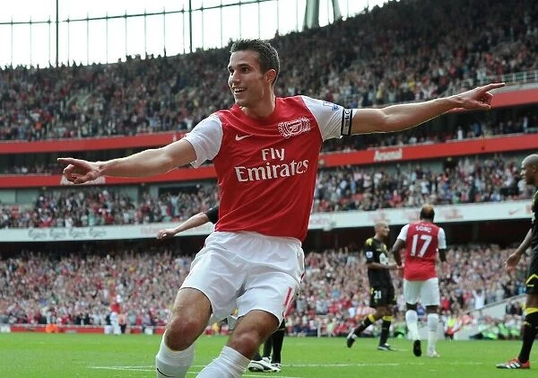 Robin van Persie celebrates scoring his and Arsenals 2nd goal, his 100th goal for Arsenal