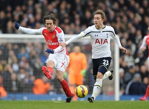 Rosicky's Brilliant Outmaneuver: Arsenal Star Outsmarts Eriksen in Premier League Clash