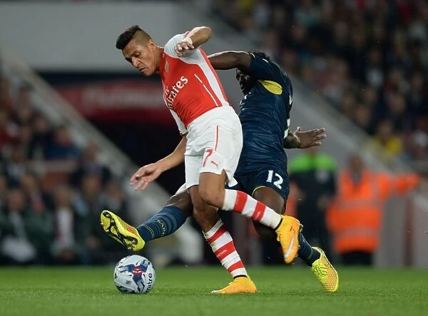 Sanchez vs. Wanyama: A League Cup Battle at the Emirates