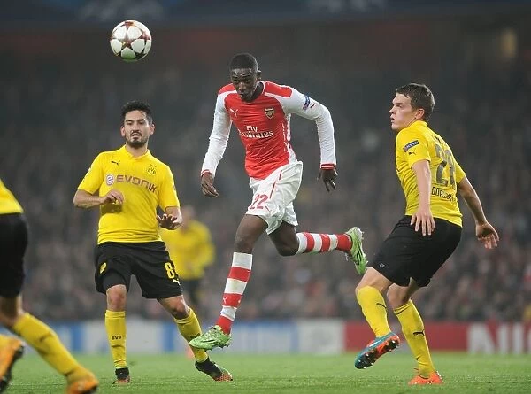 Sanogo Soars: Arsenal Star Outjumps Dortmund Defense in Champions League Clash