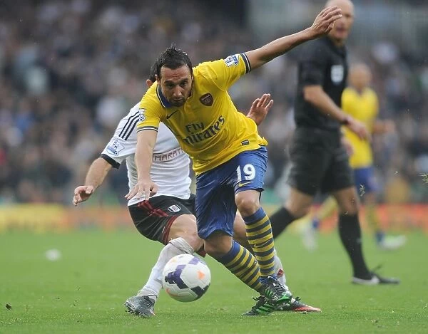 Santi Cazorla: Arsenal's Midfield Maestro in Action against Fulham, Premier League 2013-14