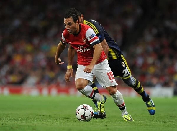 Santi Cazorla Outmaneuvers Selcuk Sahin in Arsenal's UEFA Champions League Clash