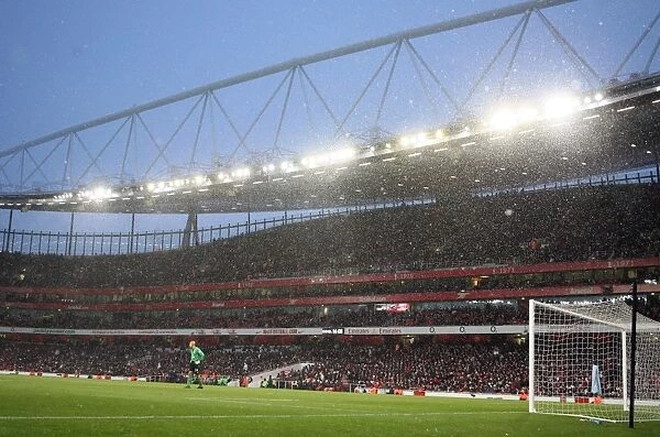 Snow falls during the match. Arsenal 2: 2 Everton. Barclays Premier League