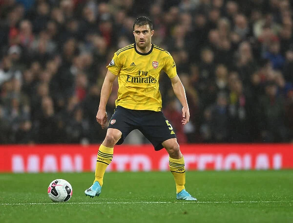 Sokratis of Arsenal Faces Off Against Manchester United in Premier League Clash (2019-20)