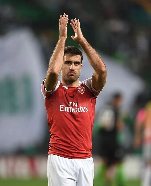 Sokratis Celebrates with Arsenal Fans after UEFA Europa League Match vs. Sporting Lisbon