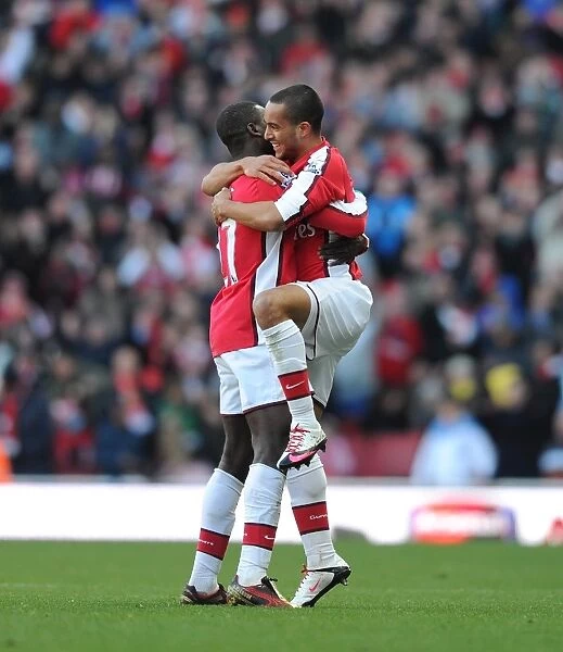Theo Walcott and Emmanuel Eboue: Celebrating Arsenal's 3-1 Victory Over Burnley