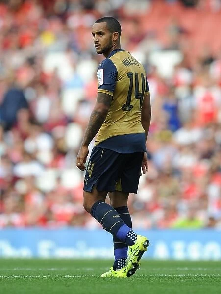 Theo Walcott Goes Head-to-Head with Olympique Lyonnais in the Emirates Cup