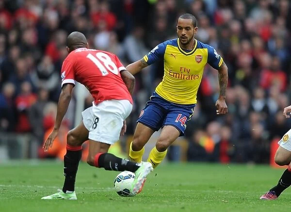 Theo Walcott vs Ashley Young: A Riveting Clash at Old Trafford - Manchester United vs Arsenal, Premier League 2014-15