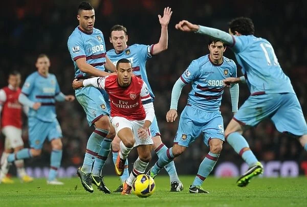 Theo Walcott vs. The West Ham United Defenders: A Battle at the Emirates