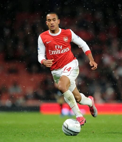 Theo Walcott's Brace: Arsenal Cruises Past Wigan Athletic in Carling Cup Quarterfinals