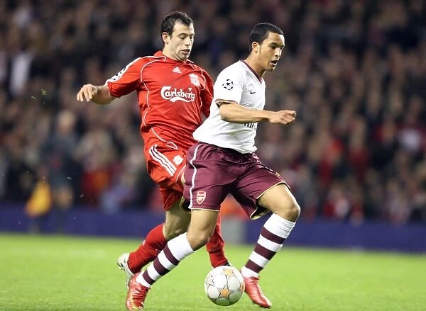 Theo Walcott's Game-Changer: Outmaneuvering Mascherano to Set Up Adebayor's Goal in Arsenal's UEFA Champions League Showdown at Anfield, 2008