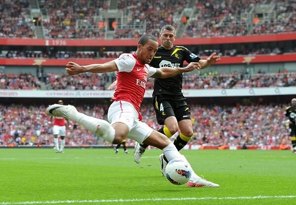 Theo Walcott's Hat-Trick: Arsenal Crushes Bolton Wanderers 3-0 in Premier League
