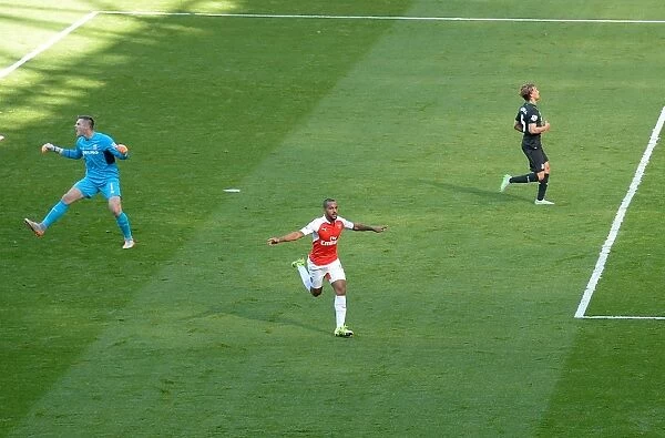 Theo Walcott's Strike: Arsenal Triumphs Over Stoke City in the Premier League (September 2015)