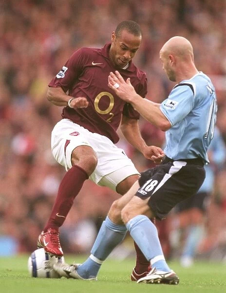Thierry Henry (Arsenal) Danny Mills (Man City). Arsenal 1: 0 Manchester City