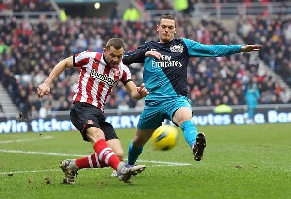 Thomas Vermaelen's Brilliant Performance Leads Arsenal to a 2-1 Victory over Sunderland in the Premier League