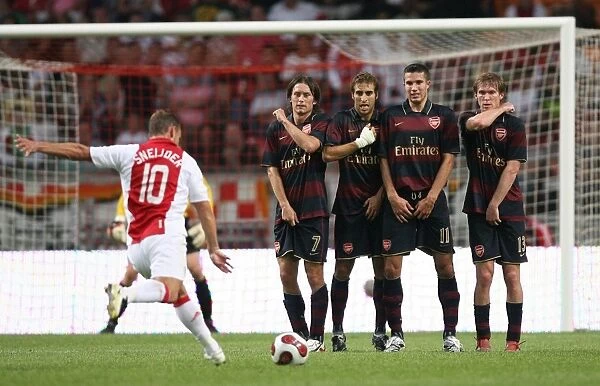 Tomas Rosicky, Mathieu Flamin, Robin van Persie and Alex Hleb in the Arsenal wall