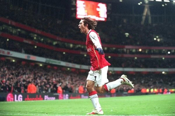 Tomas Rosicky's Triumph: Arsenal's Thrilling 3-1 Victory Over Tottenham Hotspur in Carling Cup Semi-Final