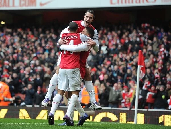 Triumphant Arsenal Trio: Oxlade-Chamberlain, Walcott, and van Persie Celebrate Goals vs. Blackburn Rovers (2011-12)