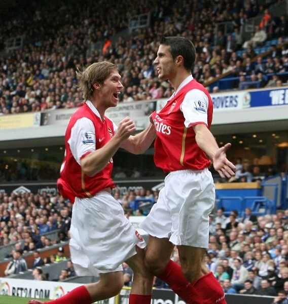 Unforgettable Moment of Celebration: Robin van Persie and Alex Hleb Secure a Draw for Arsenal against Blackburn Rovers